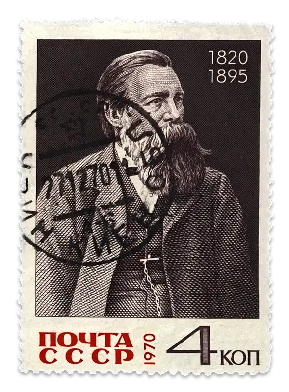A black and white stamp depicts a portrait of Karl Marx.