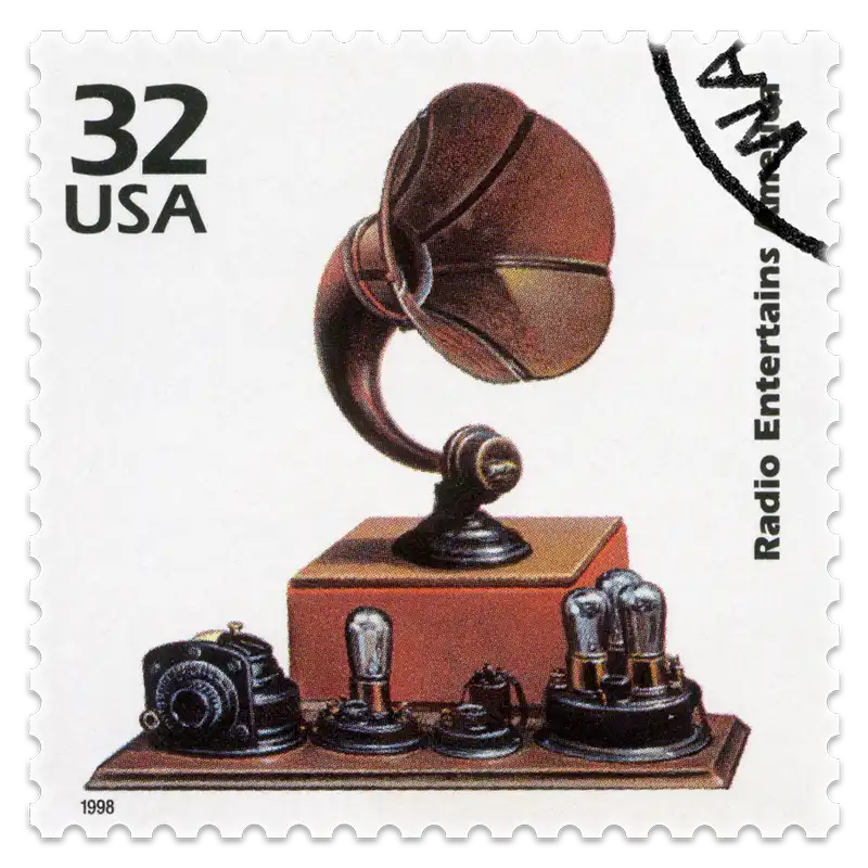 A vintage stamp with a picture of a historical gramophone represents the artistic and creative works of the past.