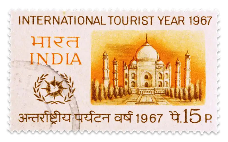 A vintage stamp with a depiction of the famous Taj Mahal in India.