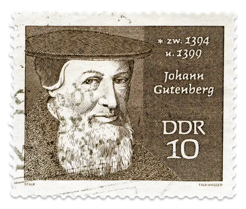 A vintage stamp with a black and white sketch of Johann Gutenberg, inventor of the printing press.