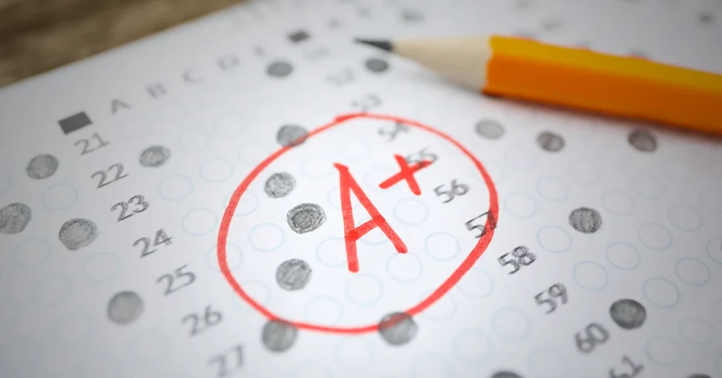 A+ AP Exam Score Sheet with pencil on it