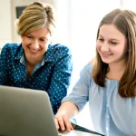 Parent supporting her daughter in test prep