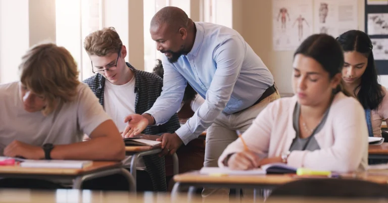 An educator is guiding students to take AP exam in AP classroom